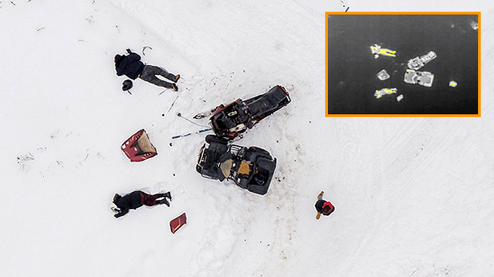 Vue d'une scène d'accident de motoneige et VTT vue par drone